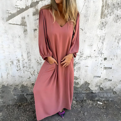 https://cdn.shopify.com/s/files/1/0949/8496/2373/files/lange-boho-jurk-met-zakken-448474_fa38833c-b81b-4706-9d9d-d4bf023d1021.jpg?v=1747650155
